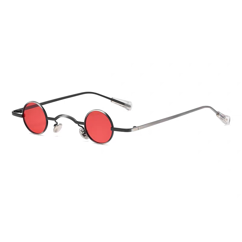 Round sunglasses with red lenses and black frames on a white background