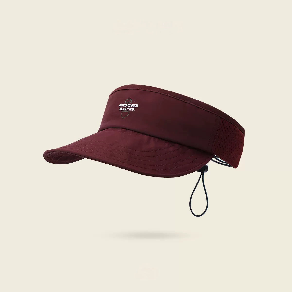 Maroon visor cap with brand logo on a beige background