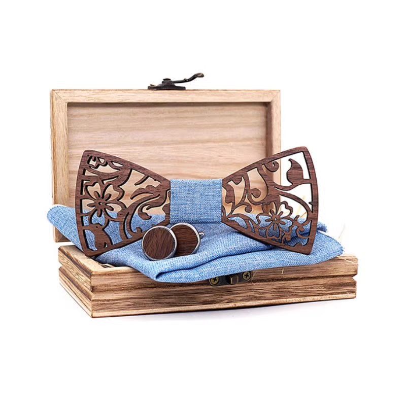 Wooden bow tie and cufflinks set with a wooden box on a white background