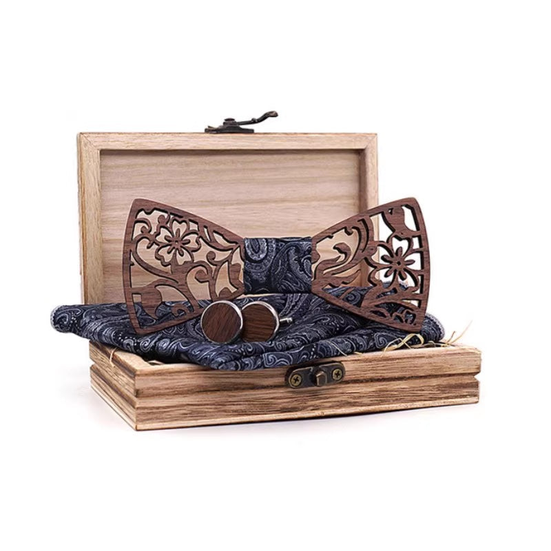 Wooden bow tie and pocket square set in a wooden box on a white background