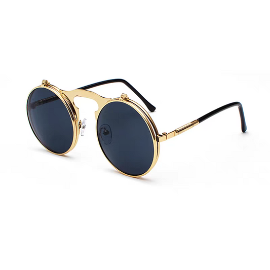 Gold-framed sunglasses with black lenses on a white background
