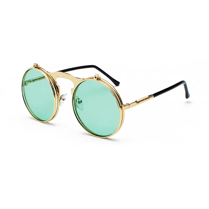 Round sunglasses with gold frame and green lenses on a white background