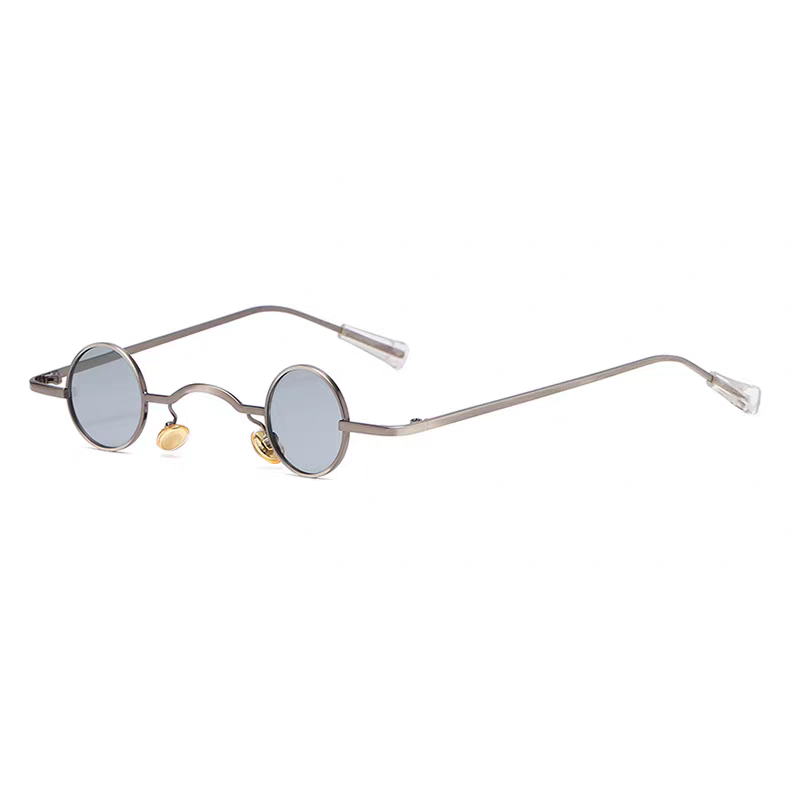 Round sunglasses with thin frame and gold accents on a white background