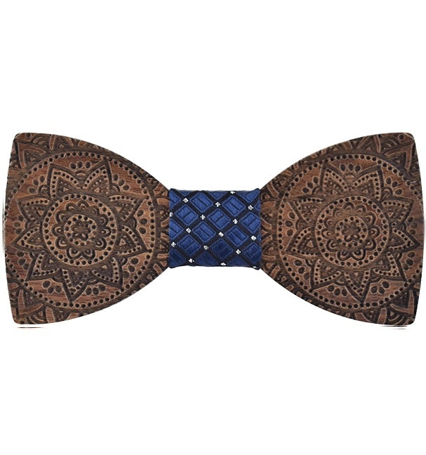Wooden bow tie with blue patterned center on a white background