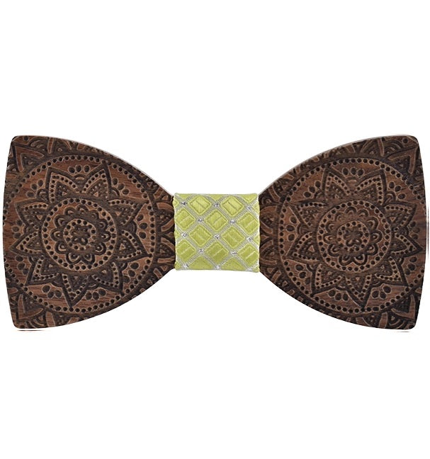 Wooden bow tie with intricate patterns on a white background