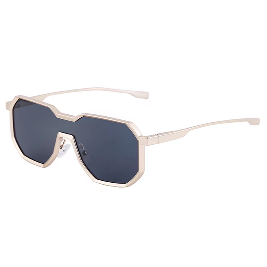 Sunglasses with gold frame and dark lenses on a white background