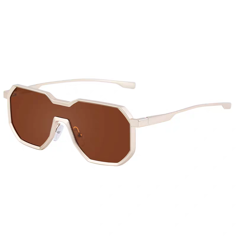 Sunglasses with gold frame and brown lenses on a white background