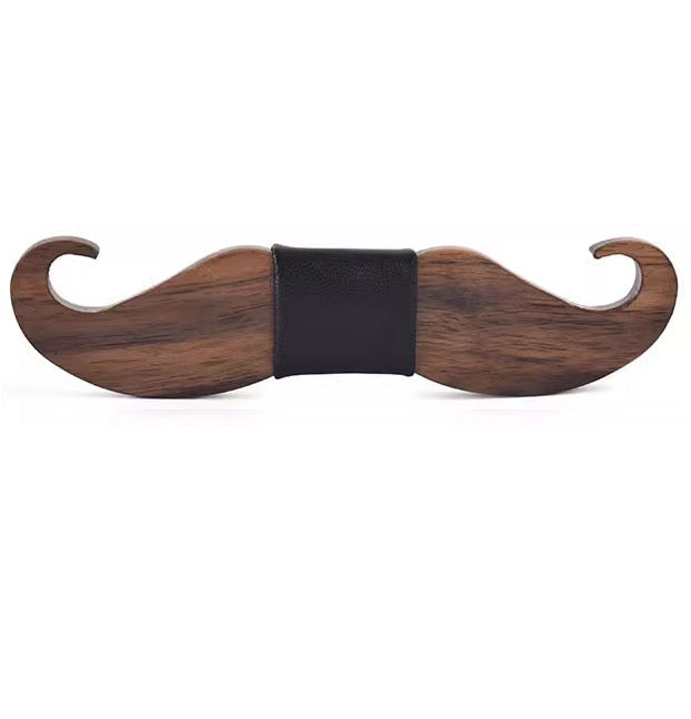 Wooden mustache-shaped object on a white background