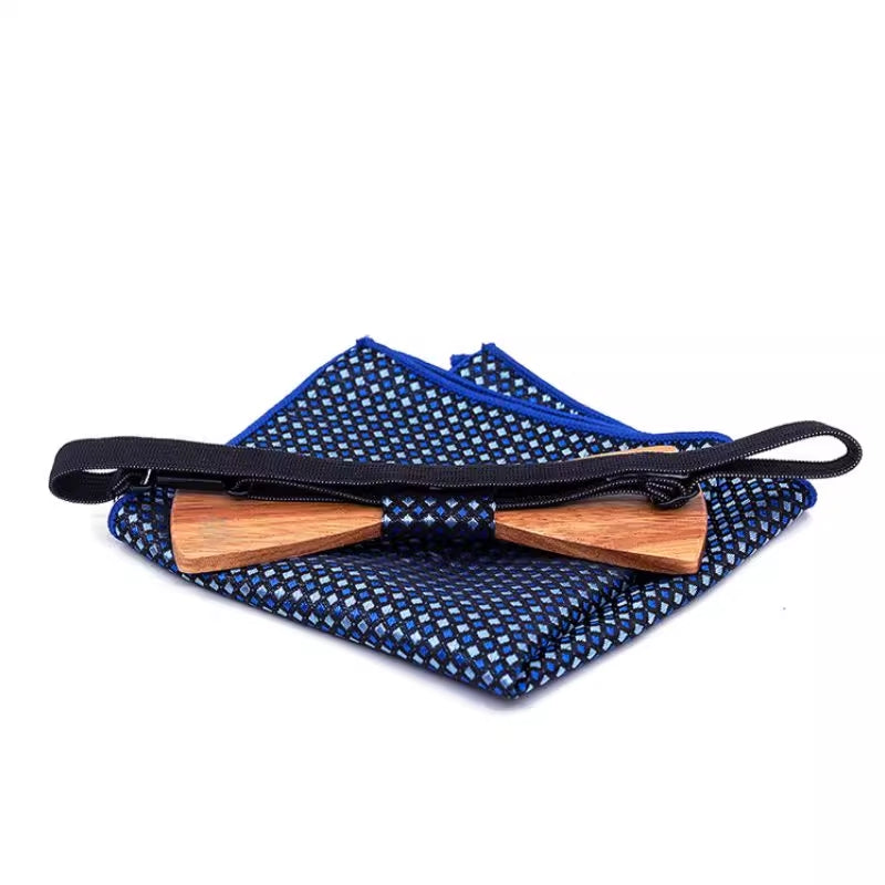 Wooden bow tie and matching pocket square with a blue pattern on a white background