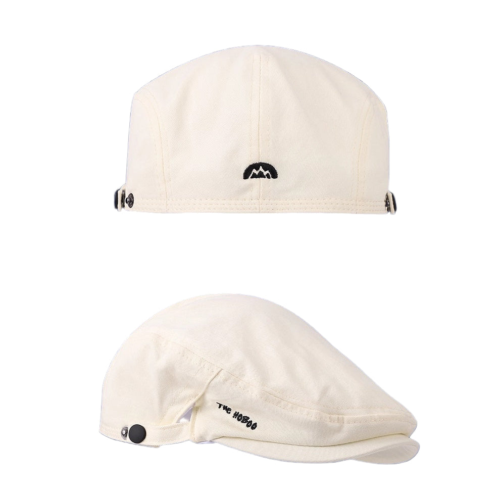 Two white caps with black logos on a blue background