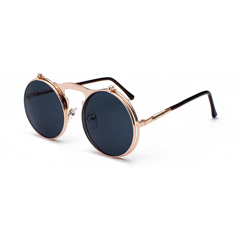 Round sunglasses with rose gold frame and dark lenses on a white background