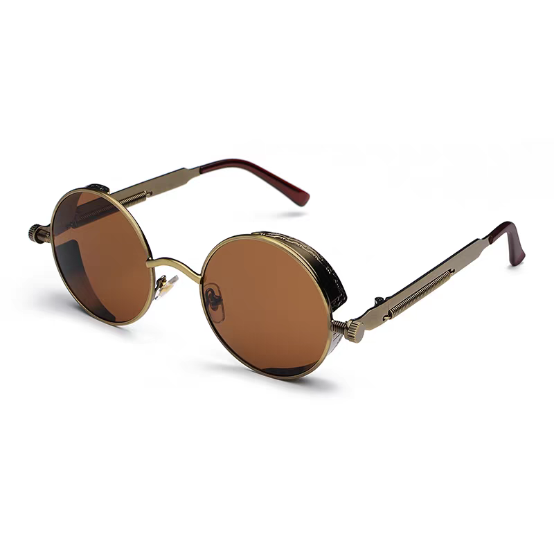 Round sunglasses with gold frame and brown lenses on a white background