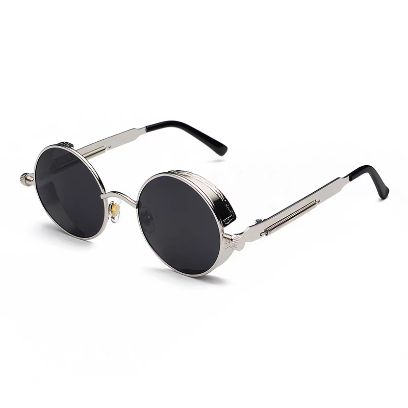 Round sunglasses with metallic frame and dark lenses on a white background