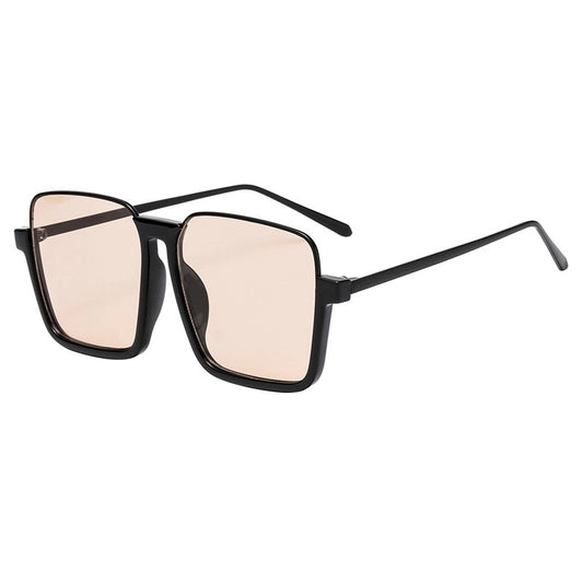 Sunglasses with black frame and beige lenses on a white background