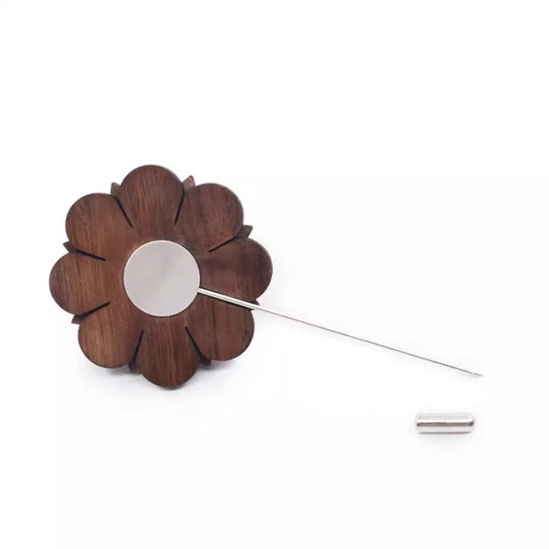 Wooden flower-shaped lapel pin on a white background