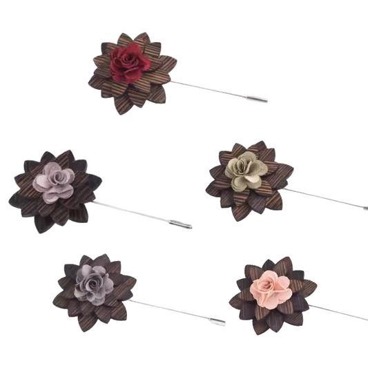Set of floral brooches on a white background with text above.