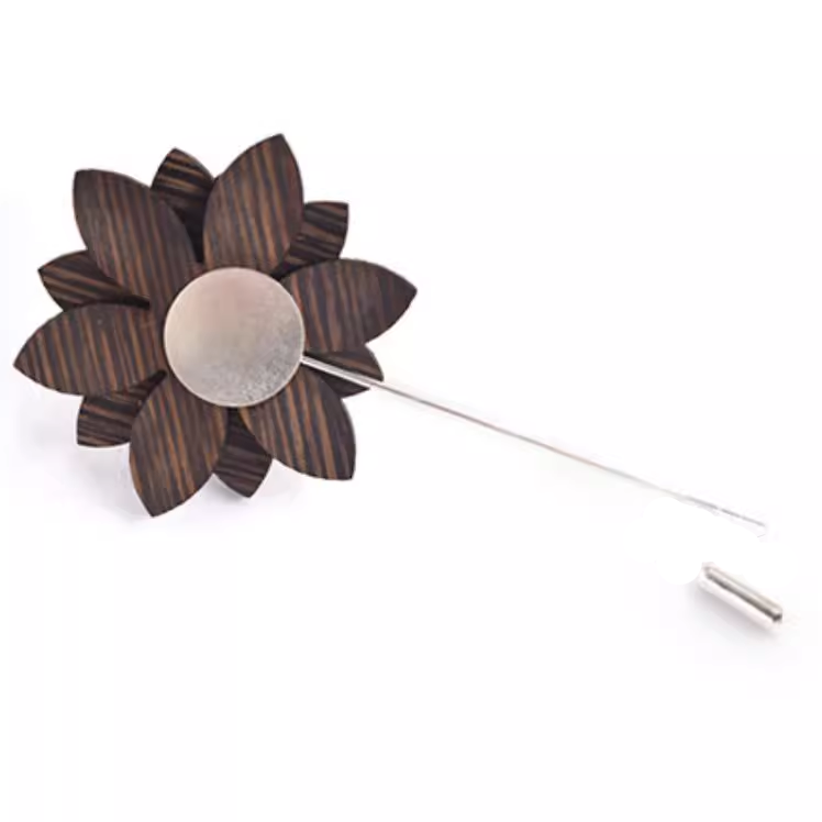 Wooden flower lapel pin on a white background