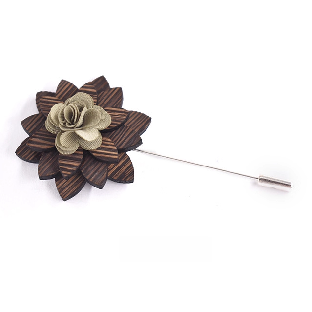 Wooden flower lapel pin on a white background