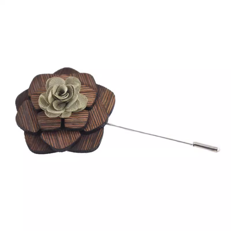 Wooden flower lapel pin on a white background
