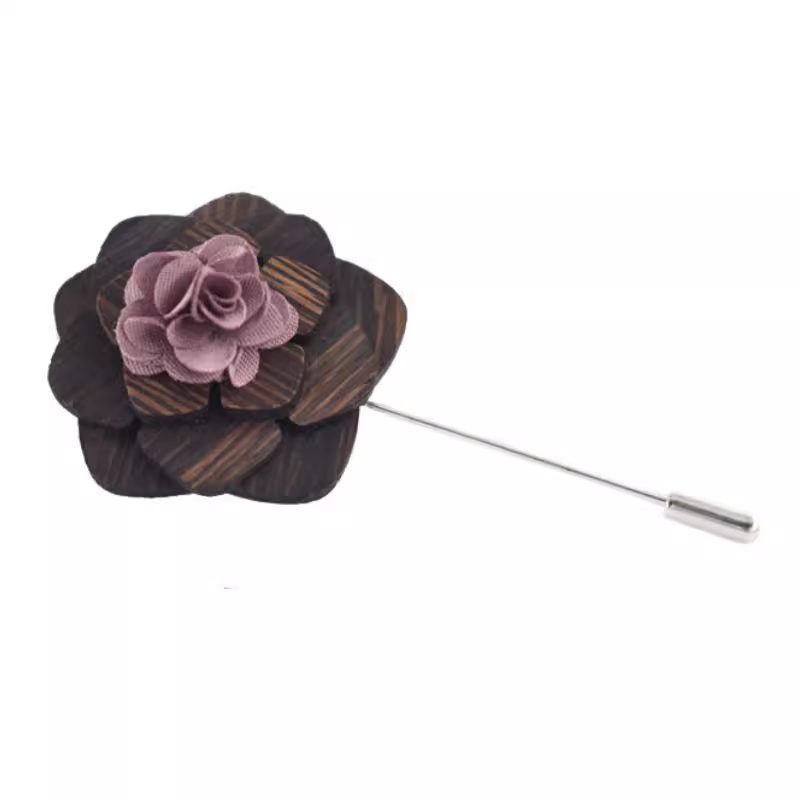 Floral lapel pin with wooden texture and purple flower on a white background