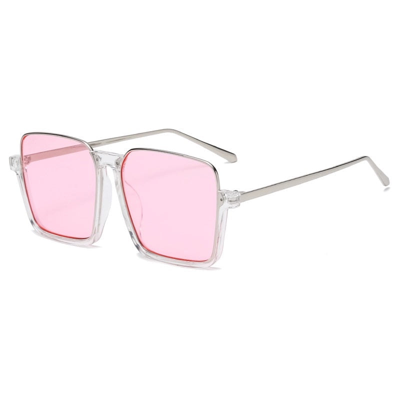 Sunglasses with pink lenses and silver frame on a white background