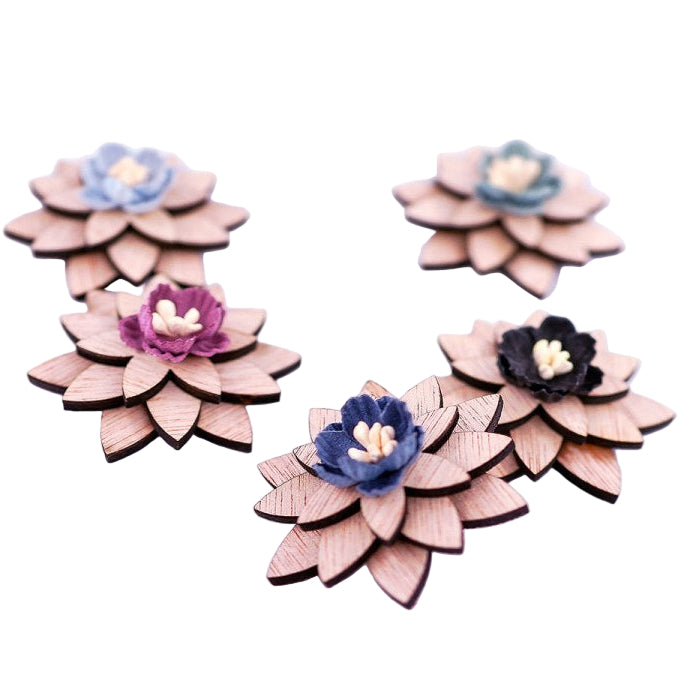 Wooden flower-shaped decorations on a white background