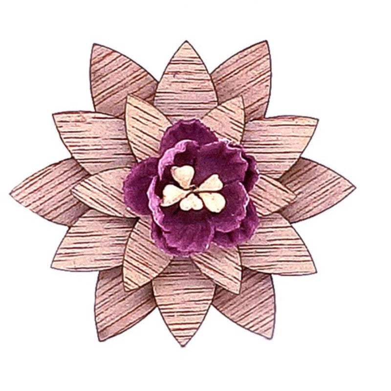 Decorative flower with pink petals and a purple center on a white background
