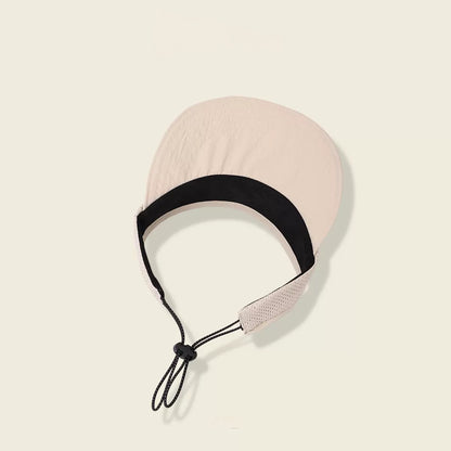 Beige headband with black strap on a beige background