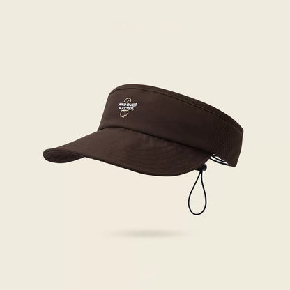 Brown visor cap with a brand logo on a beige background