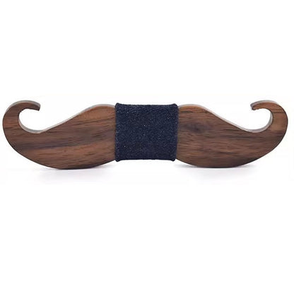 Wooden mustache-shaped object with a black band on a white background