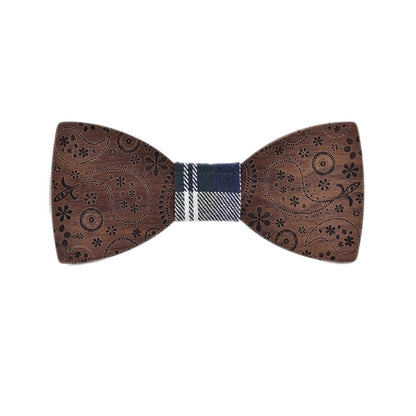 Wooden bow tie with decorative patterns on a white background