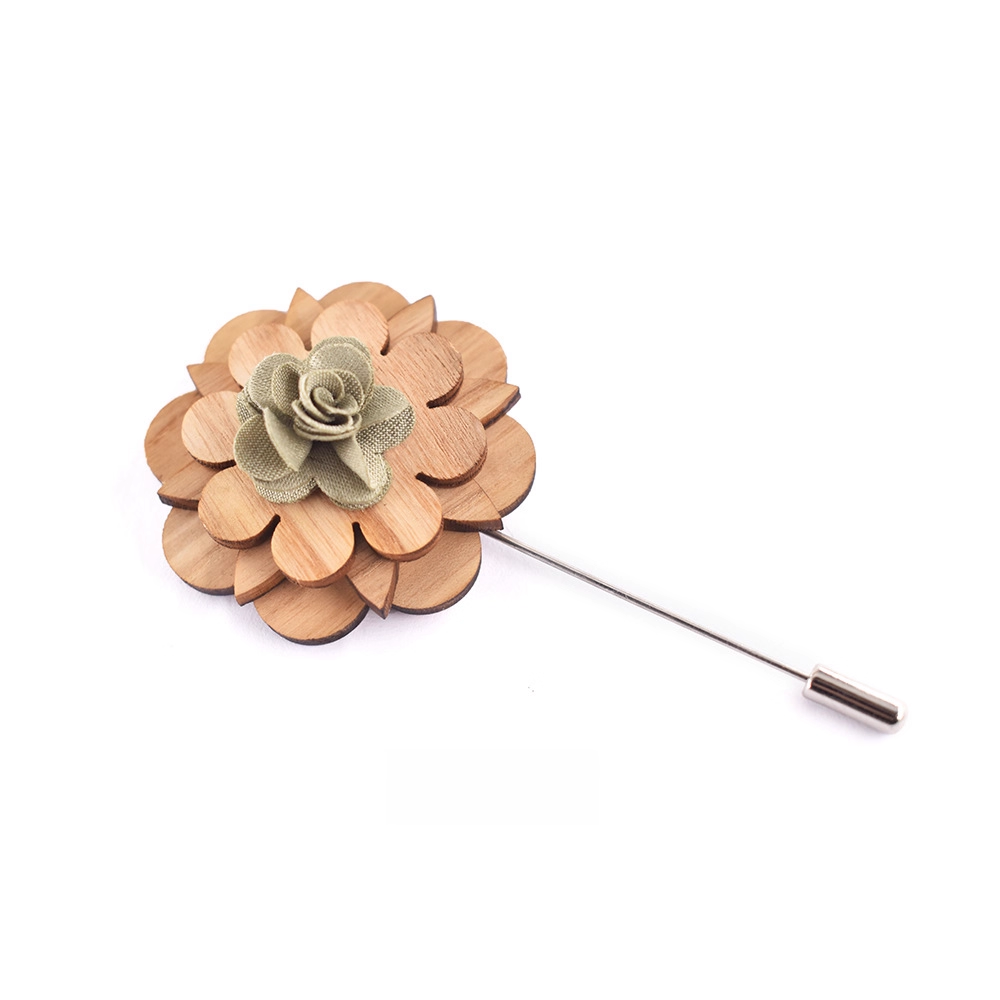 Wooden flower lapel pin on a white background