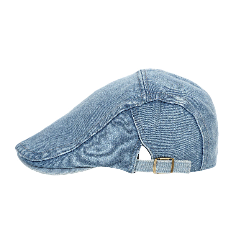 Blue denim cap on a white background 