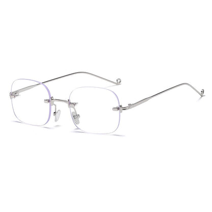 Silver-rimmed eyeglasses on a white background 
